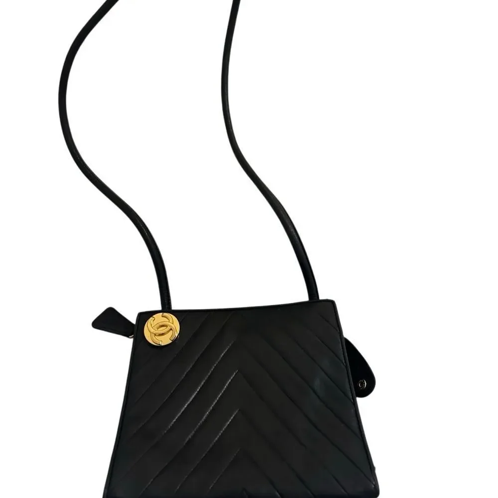 CHANEL Black Chevron Leather Shoulder Bag with Gold Accent